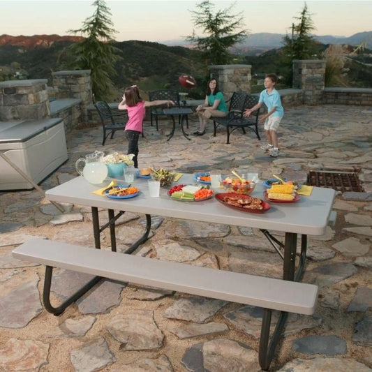 Savor outdoor meals with ease using our Lifetime Classic Folding Picnic Table, sized at 6ft for convenient dining anywhere. Whether it's a backyard barbecue or a camping adventure, this table offers durability and convenience. Crafted for portability and stability, elevate your outdoor dining experience with this versatile picnic table. Explore our collection for premium folding picnic tables designed for effortless outdoor gatherings!